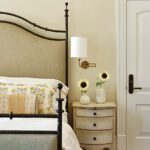 Formal guest bedroom with upholstered bed