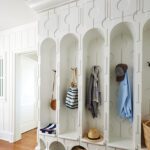 Mudroom with a whimsical cabinet design.