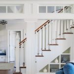 White staircase and transom windows