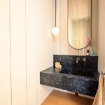 Contemporary powder room with floating vanity