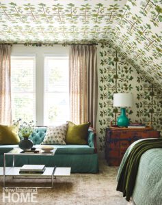 Cozy third floor sitting room with patterned Pierre Frey wallpaper.