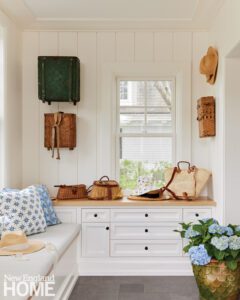 Traditional mudroom with hanging baskets.