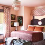 Guest bedroom decorated in different hues of pink and rose.