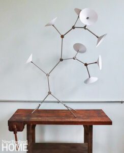 Atlas 3 chandelier in aged brass and black walnut by Gordon Auchincloss by Gordon Auchincloss.
