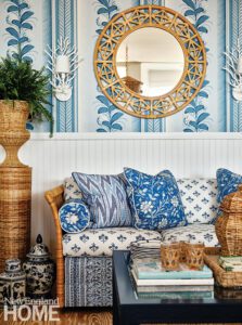 Rattan settee with blue and white fabrics