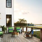 Large wooden deck with a view of an estuary.