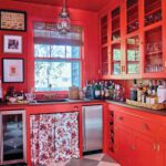 Home bar painted top to bottom in bright red.