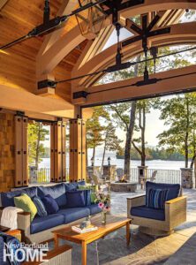 Rustic timber frame porch overlooking a New Hampshire lake.