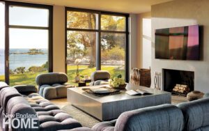 Contemporary family room with large windows overlooking Long Island Sound.