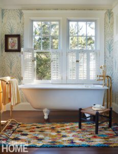 Country-style bathroom with claw footed tub.