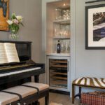 Music room with a piano and built-in bar.