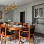 gray dining room with custom cabinetry
