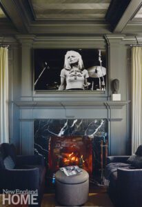 Glossy gray fireplace with a photo of Debbie Harry
