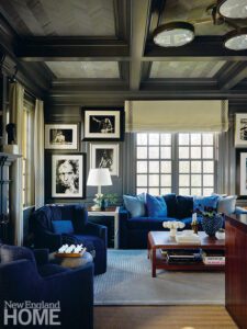 Home office with gray walls and blue velvet upholstered pieces