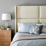 Serene primary bedroom with a leather headboard.