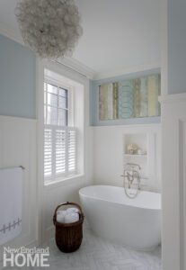 Bathroom with white tile and blue walls