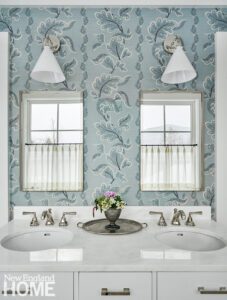 Bathroom with light blue floral wallcovering