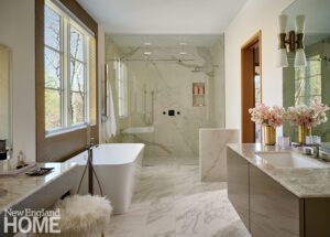 Contemporary white bathroom with a freestanding tub and floating vanity