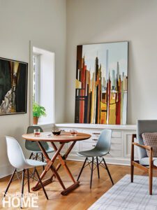 Round dining table with Eames chairs.