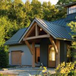 Post and beam front entrance to a Vermont guest house with a