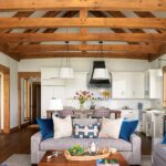 Sitting area of a Vermont guest house with wooden cross beams