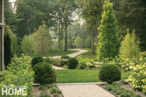 A grand landscape design with a winding drive