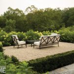 Gravel patio with traditional furniture