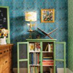 Wallpaper and a painted green cabinet at Sew & Bloom