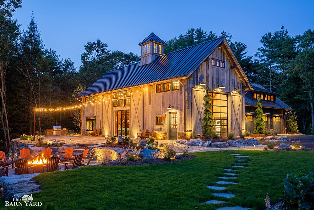 Large party barn lit at night 