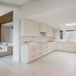 L-shaped white kitchen