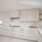 Long run of contemporary cabinets