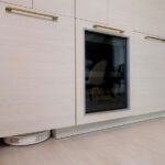 Kitchen cabinet with built in Roomba