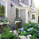 Shingle-style house with window boxes