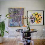 Contemporary black round table and lucite chairs