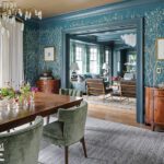 Dining room with wallpaper and blue trim