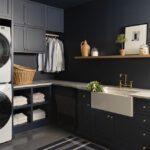 Laundry room painted in a dark navy