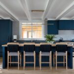 Kitchen with dark blue cabinets