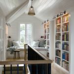 Second floor stair landing with bookshelves