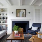 Living room fireplace with a black stone surround