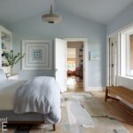 Serene primary bedroom with light blue walls