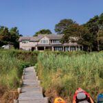 Beach house with a long boardwalk to the beach