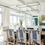Beach house dining room with blue and white chairs