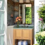 Powder room with mural-like wallpaper