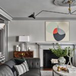 Fireplace view in a living room with traditional architecture and contemporary furnishings