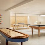 Basement game room with contemporary game tables