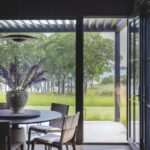 Breakfast nook with a large wall of windows