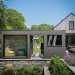 Exterior of a home's wellness area including a sauna