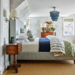 Primary bedroom with blue and white bedding