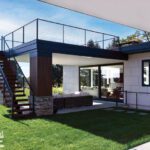 Exterior entertaining space with a rooftop deck and covered seating area