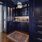 Butler's pantry with navy blue cabinetry
